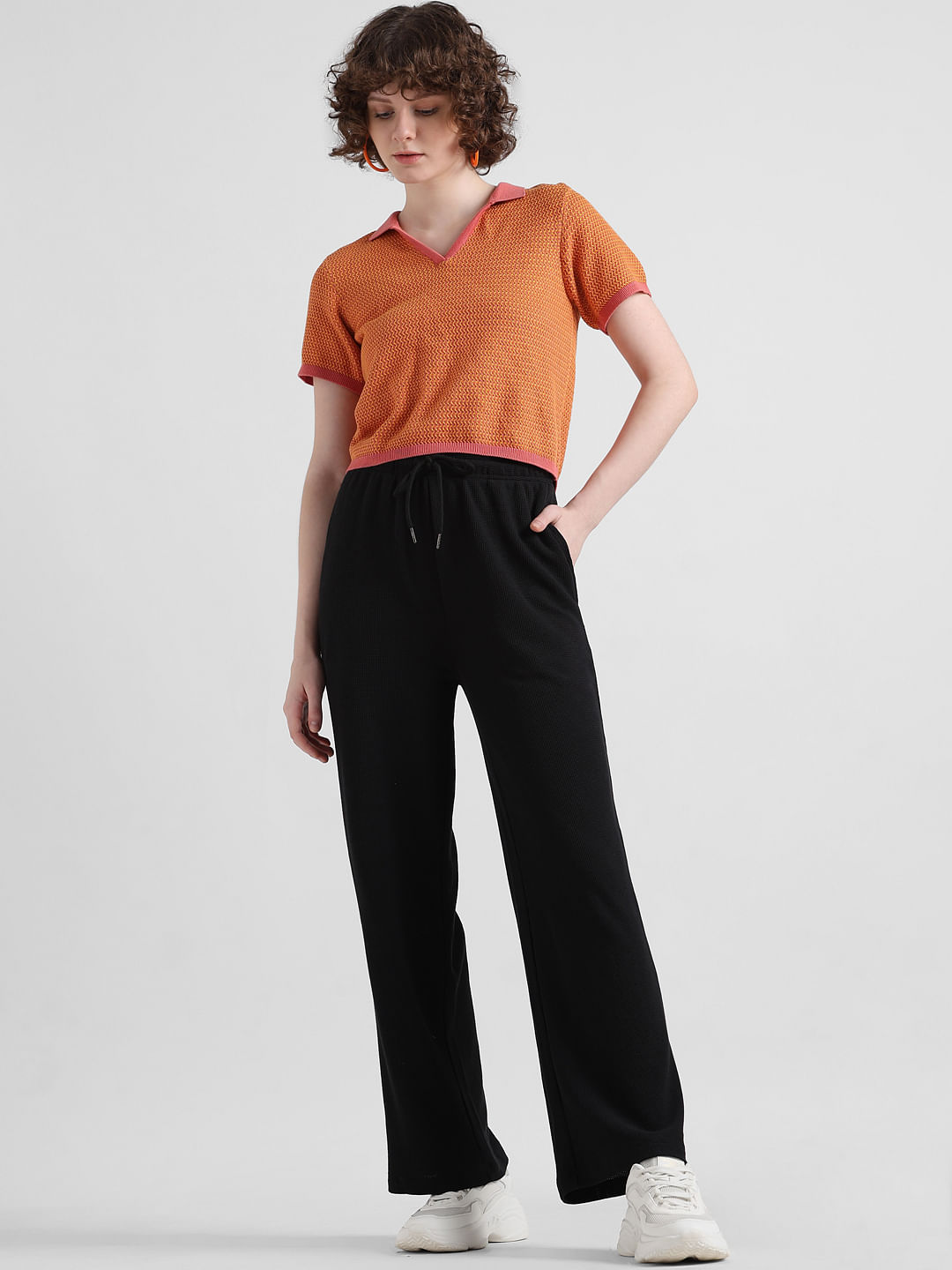 Pants with a high front wrap waist and snap button. Wide leg. Side hidden  in-seam zip closure. - Black | ZARA United States